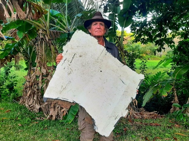 ผู้เชี่ยวชาญยืนยันเศษซากชิ้นส่วนเครื่องบิน MH370 - ảnh 1