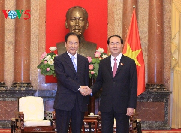 President Tran Dai Quang receives Chinese Xinhua News Agency Chief - ảnh 1