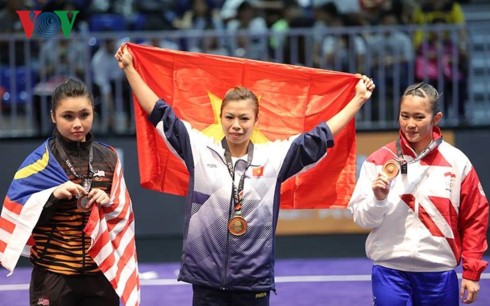 Wushu athletes win first 2 gold medals for Vietnam at SEA Games 29 - ảnh 2