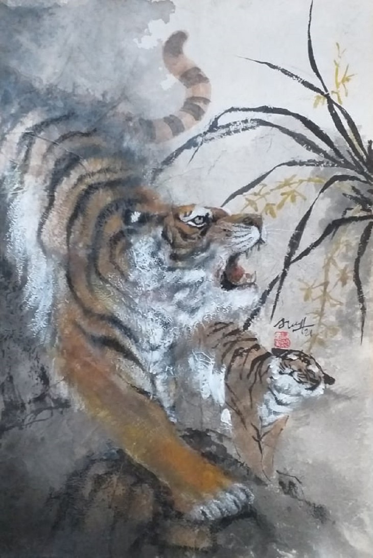 Lively paintings by Nguyen Doan Ninh to usher in Year of the Tiger - ảnh 12