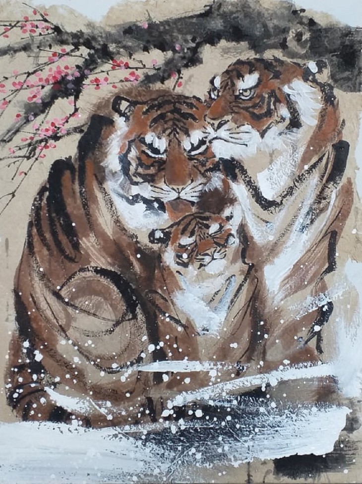Lively paintings by Nguyen Doan Ninh to usher in Year of the Tiger - ảnh 2