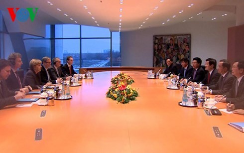 Staatspräsident Truong Tan Sang trifft deutsche Bundeskanzlerin Angela Merkel - ảnh 1