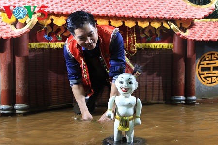 Phan Thanh Liem – der das traditionelle Wasserpuppentheater verbreitet - ảnh 1