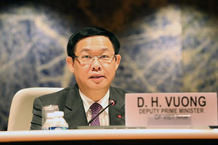 Vizepremierminister Vuong Dinh Hue arbeitet mit Vertretern der internationalen Organisationen  - ảnh 1