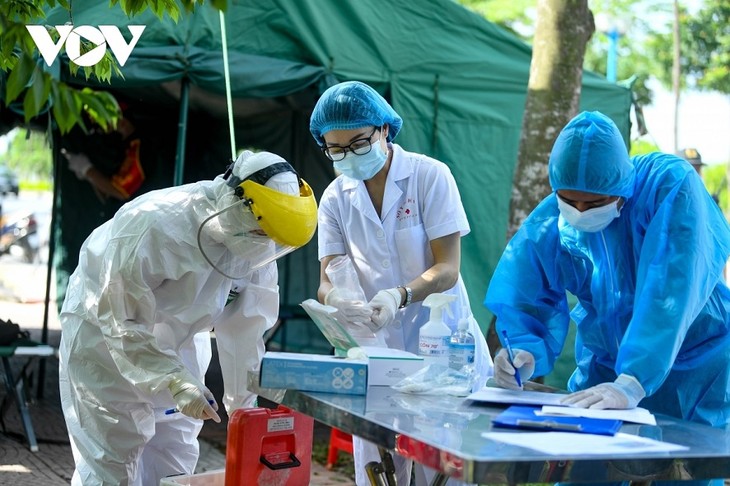 Binnen 24 Stunden: mehr als 13.000 Covid-19-Neuinfizierte in Vietnam - ảnh 1