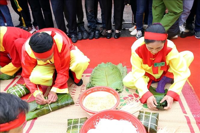 Wettbewerb zum Wickeln von Chung-Kuchen und zum Stampfen von Day-Kuchen in Hai Duong  - ảnh 1