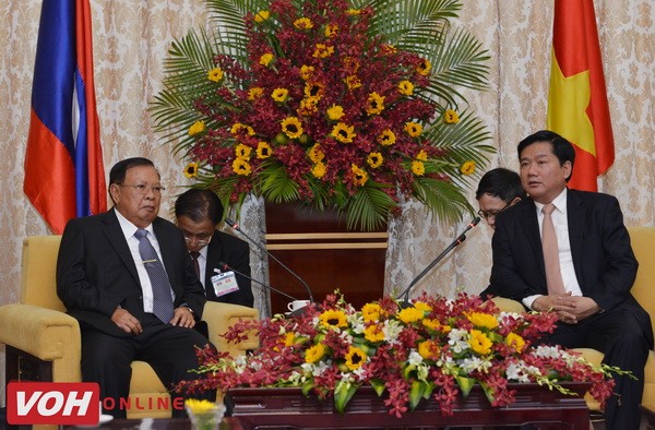 Laos’s Party General Secretary and President visits HCM city - ảnh 1