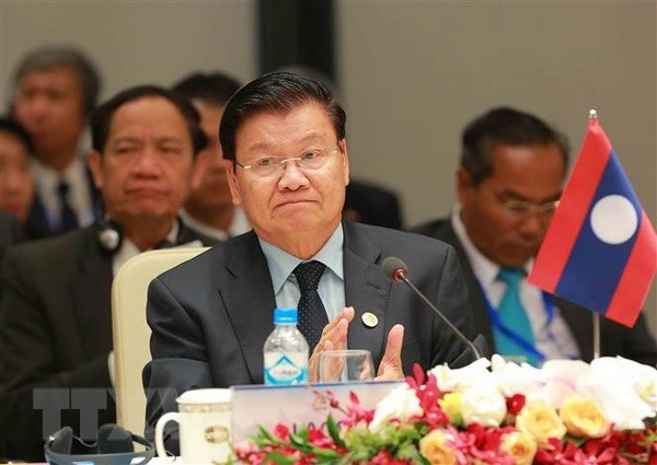 老挝总理通伦出席越南2018年世界经济论坛东盟峰会 - ảnh 1