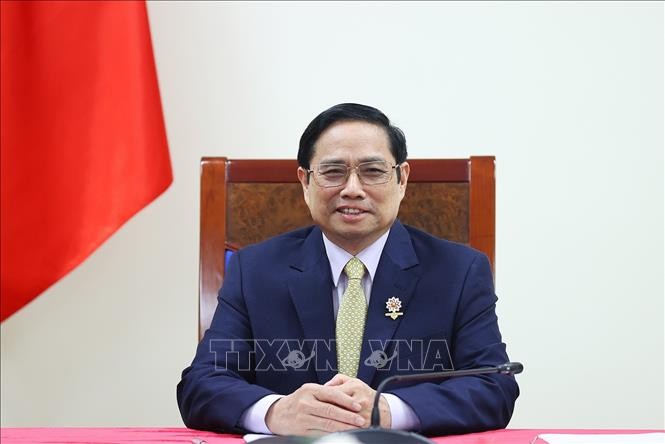 越南政府总理范明政对宗教神职人员和教徒在防疫工作中做出的努力表示感谢 - ảnh 1