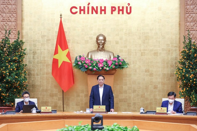 越南政府总理范明政要求立即落实2022年各项任务 - ảnh 1