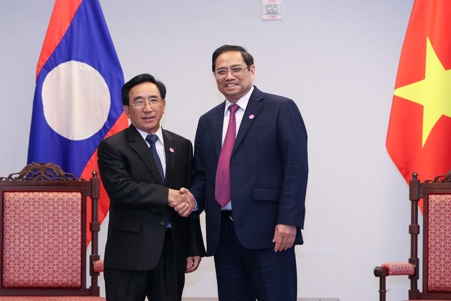 越南政府总理范明政会见老挝总理及东盟各国领导人 - ảnh 1
