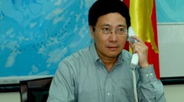 Vizepremier und Außenminister Pham Binh Minh telefoniert mit chinesischem Außenminister  - ảnh 1