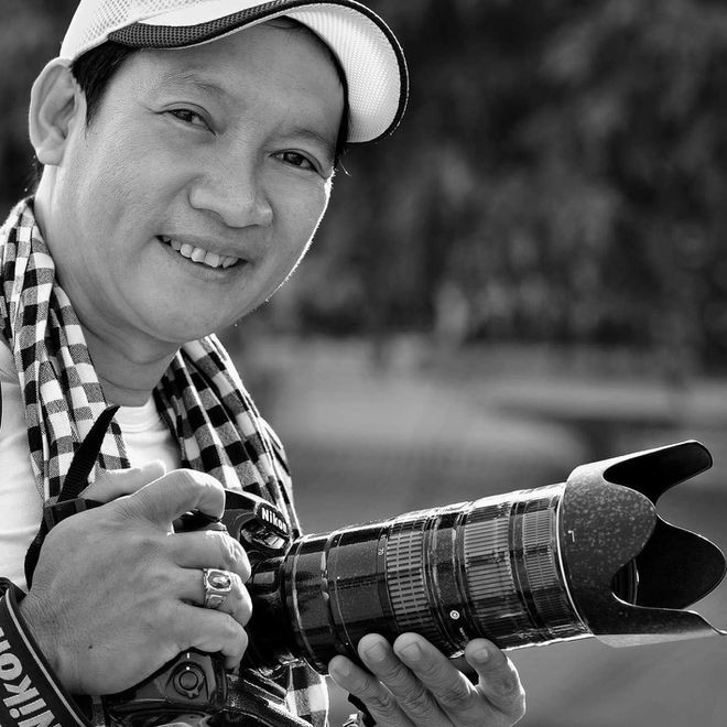 Fotograf Tran The Phong fängt Lächel für glückglichen Tag auf - ảnh 1