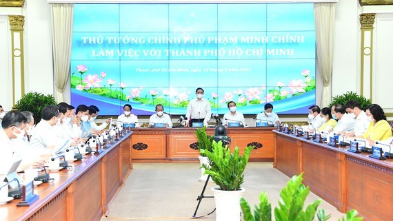 Premierminister Pham Minh Chinh trifft Leitung von Ho Chi Minh Stadt - ảnh 1
