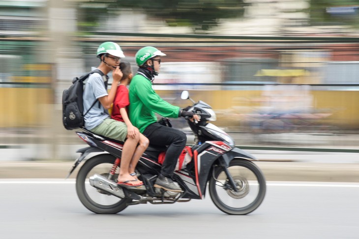 ລົດຈັກຮັບຈ້າງນຳໃຊ້ເຕັກໂນໂລຊີ - ảnh 1