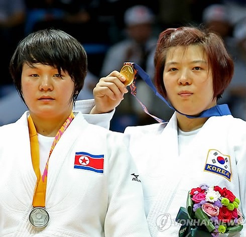 한국 – 조선,  동아시아  유도 선수권 대회에서 같은 깃발 아래 행진 - ảnh 1