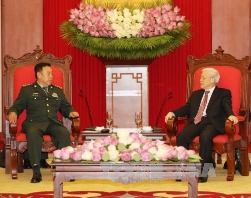 Máximos dirigentes vietnamitas reciben a alto funcionario militar de China - ảnh 1