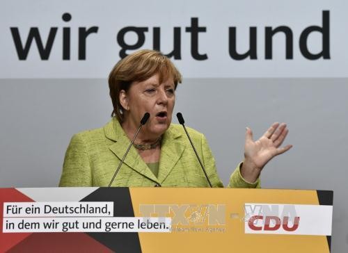 Merkel ofrece un debate televisivo intenso en vísperas de las elecciones generales - ảnh 1