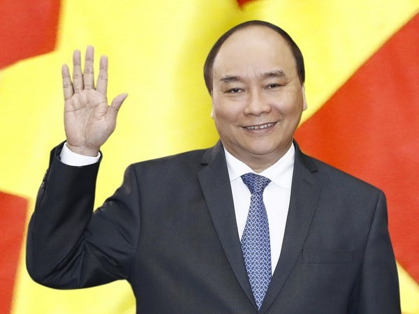 Premier vietnamita parte hacia Cumbre Asean-India - ảnh 1