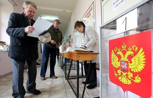Rusia celebra las elecciones locales y regionales - ảnh 1