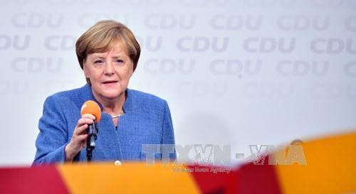 German Chancellor announces coalition talks with FDP, Greens - ảnh 1