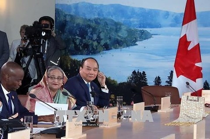 Nguyen Xuan  Phuc총리 확대 G7정상회의 참여 및 캐나다 방무 마무리 - ảnh 2
