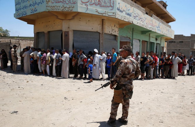 Les forces irakiennes s'approchent des dernières poches jihadistes à Mossoul - ảnh 1