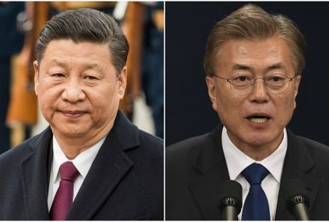 Moon Jae-in et Xi Jinping vont œuvrer à la signature d'un traité de paix mettant fin à la guerre de  - ảnh 1