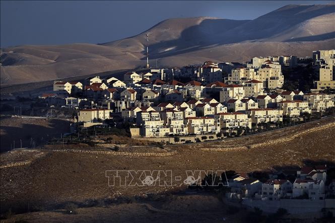 Des colons juifs acceptent de quitter un bâtiment de Cisjordanie occupée  - ảnh 1