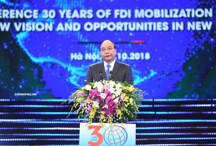 Вьетнам придерживается политики привлечения прямых иностранных инвестиций - ảnh 1