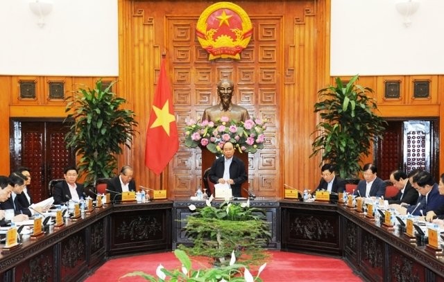 Премьер Вьетнама председательствовал на заседании по развитию производства и бизнеса - ảnh 1