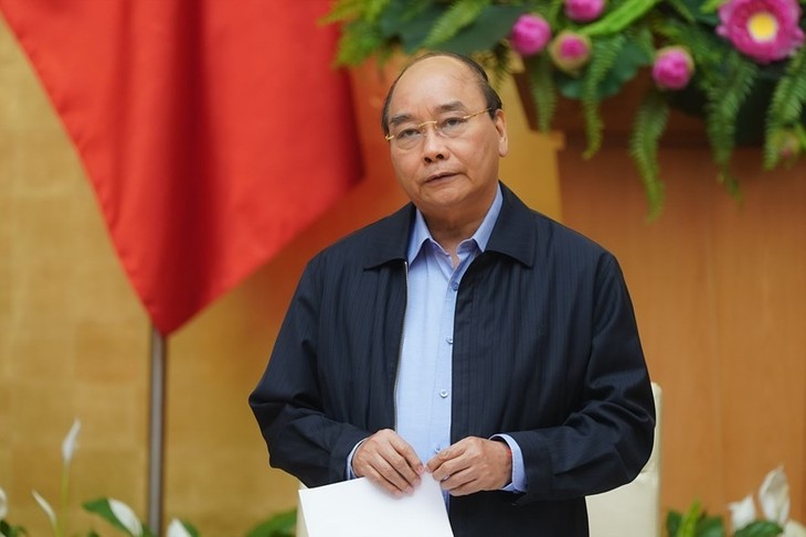 В Ханое прошло онлайн-совещание посткома правительства Вьетнама по противодействию Covid-19 - ảnh 1