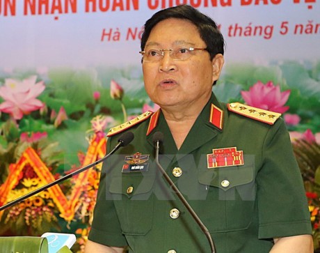 Bộ trưởng Bộ Quốc phòng Việt Nam Ngô Xuân Lịch tiếp Đại sứ Thái Lan và Đại sứ Singapore - ảnh 1