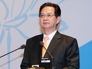 Perdana Menteri VN Nguyen Tan Dung  menghadiri CAEXPO-9 - ảnh 1