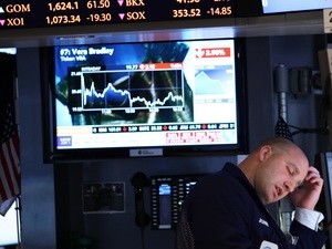 Pasar  Bursa Efek Amerika Serikat dan Dunia  tergoayahkan setelah pemilihan presiden. - ảnh 1