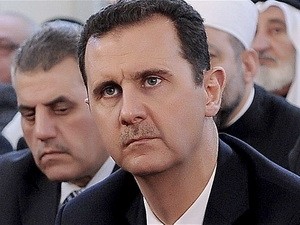 Presiden Suriah  Bashar al-Assad  menyatakan akan tidak mengundurkan diri - ảnh 1
