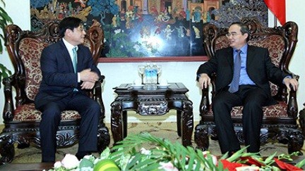 Deputi PM Vietnam, Nguyen Thien Nhan menerima Presiden  Badan Kerjasama Internasional Republik Korea - ảnh 1