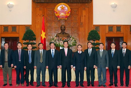 PM Vietnam, Nguyen Tan Dung menerima para konselor dan  perwakilan dagang Vietnam di luar negeri - ảnh 1
