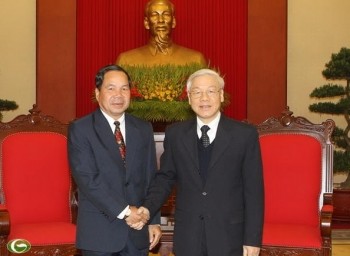 Sekjen KS PKV, Nguyen Phu Trong menerima delegasi tingkat tinggi Kementerian Keamanan Laos - ảnh 1
