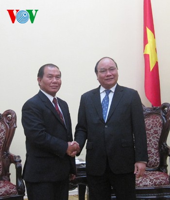 Deputi PM Vietnam, Nguyen Xuan Phuc menerima Menteri Dalam Negeri Laos - ảnh 1