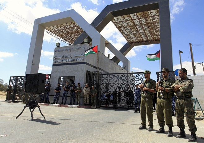 Mesir memperpanjang waktu membuka koridor Rafah yang menghubungkan jalur Gaza - ảnh 1