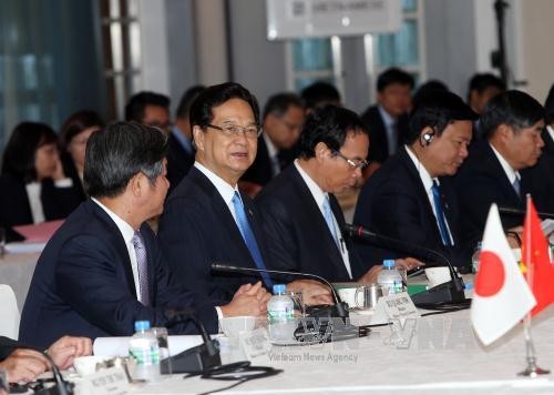 PM Vietnam, Nguyen Tan Dung menghadiri simposium dengan badan-badanusaha Jepang - ảnh 1