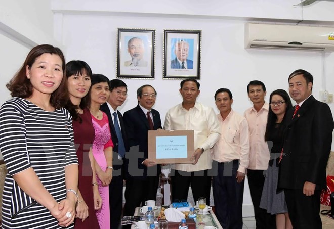 Laos mengadakan Lokakarya pengalaman meliput berita pada event besar untuk koresponden ASEAN - ảnh 1