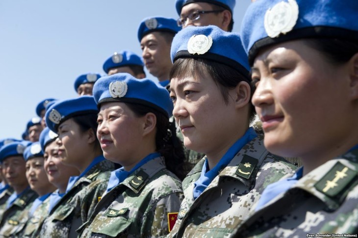 Vietnam dan Tiongkok berbagi pengalaman mengenai aktivitas menjaga perdamaian - ảnh 1