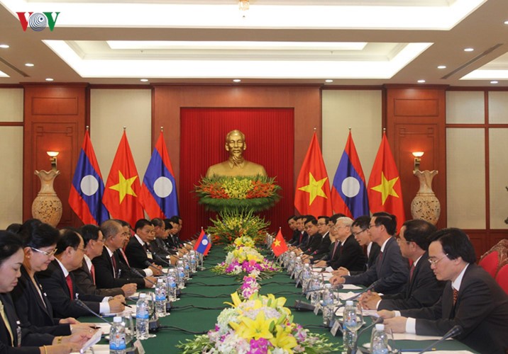 Sekjen, Presiden RDR Laos, Bounhang Volachith memulai kunjungan persahabatan resmi di Vietnam - ảnh 2