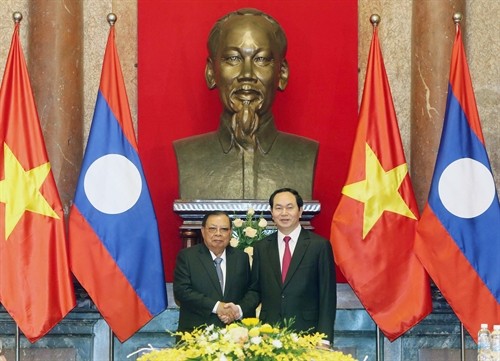 Presiden Negara Vietnam, Tran Dai Quang memulai kunjungan kenegaraan ke RDR Laos - ảnh 1