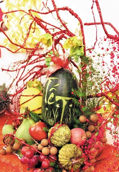 Новогодний поднос с пятью видами фруктов – специфическая черта вьетнамской культуры - ảnh 2