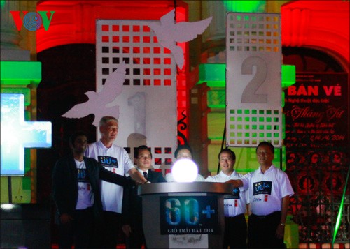 Фотографии с акции «Час Земли-2014» в Ханое - ảnh 12