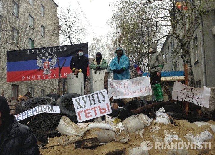 Демонстрации на Украине переросли в кровавые столкновения - ảnh 1