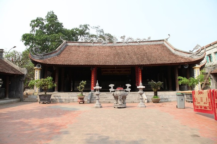 Общиный дом вьетнамской деревни - уникальное архитектурно-скульптурное сооружение - ảnh 1